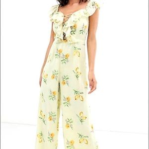 ASOS DESIGN off shoulder lemon print jumpsuit with lace up detail